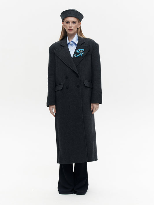 Wool coat with the blue eye patch
